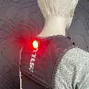 Smini_Rear_Light_38467_clip_on_vest_glowing.webp